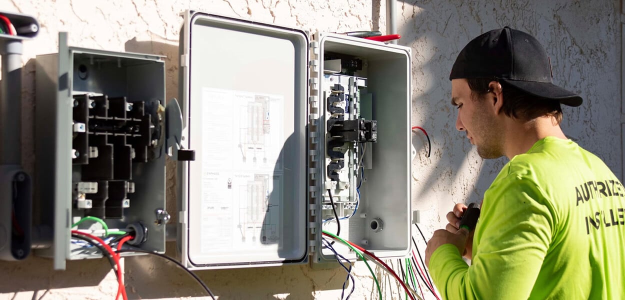 Technician Replacing Circuit Breakers — Solar Power Systems in Gold Coast, QLD