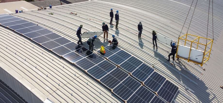 Solar Panel Installation on a Roof of Factory — Solar Power Systems in Gold Coast, QLD