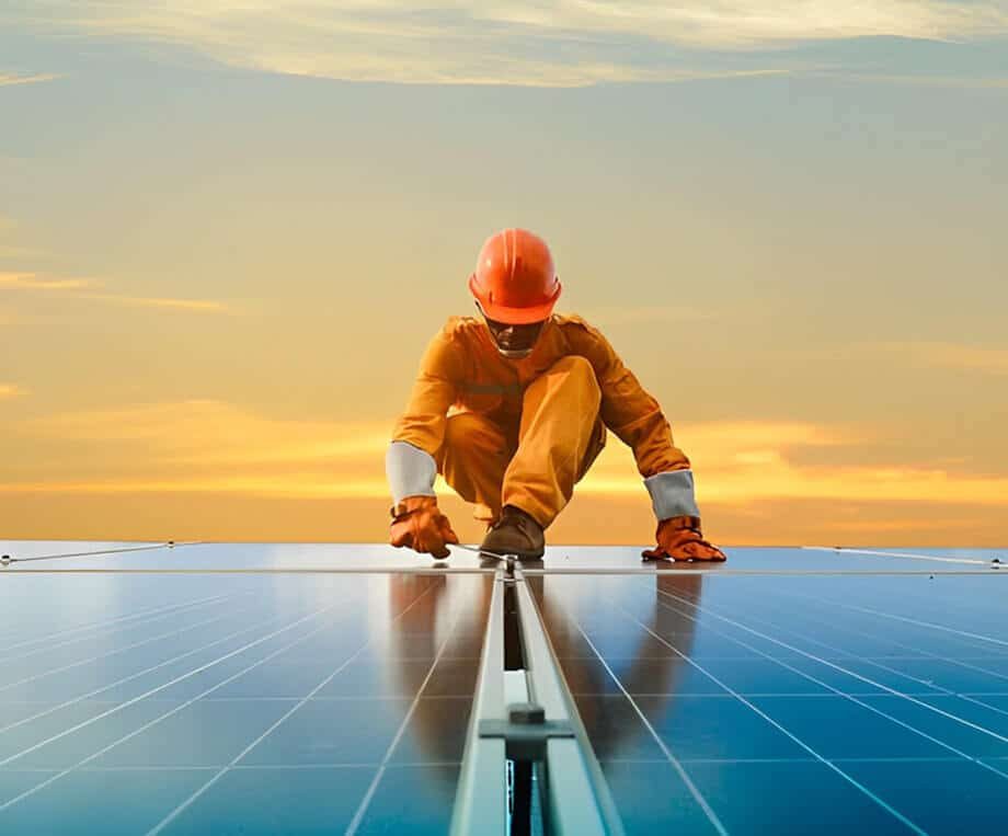 Man Working at Solar Power Station — Solar Power Systems in Gold Coast, QLD